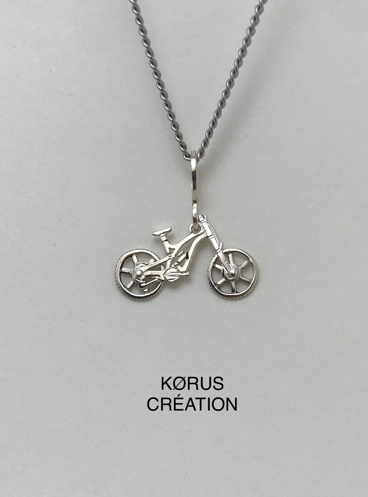 Bijou articulé vélo argent (faîtes tourner les roues)